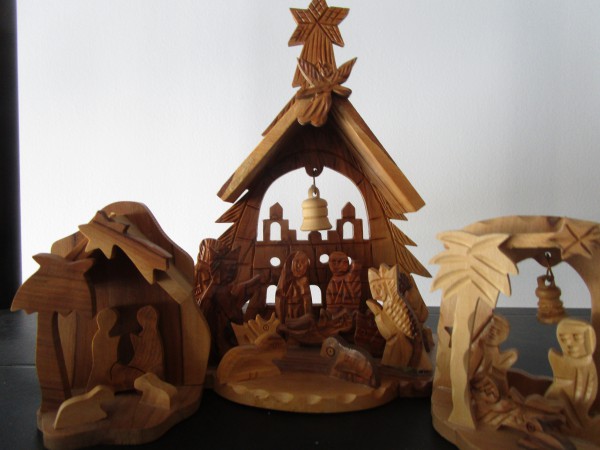 Three small wooden nativity scenes
